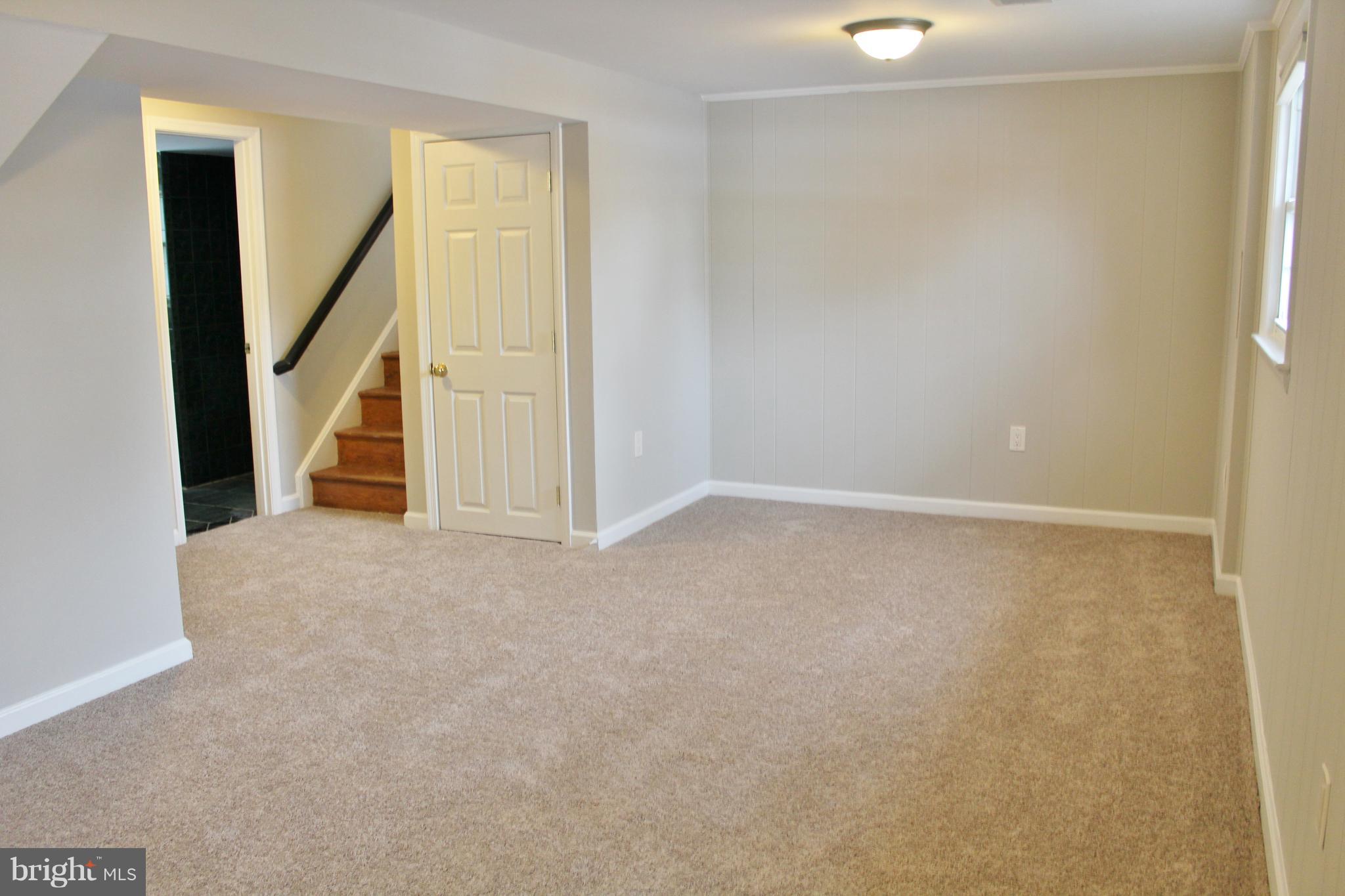 8004 Frye Road Alexandria, VA 22309 - Photo 18 of 21 a view of an empty room with stairs