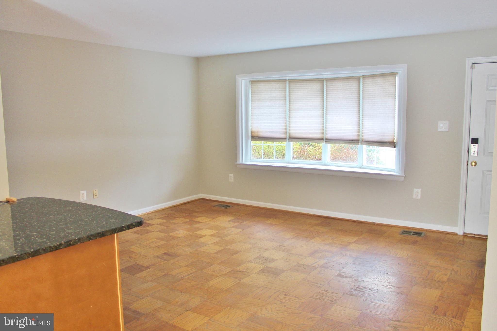 8004 Frye Road Alexandria, VA 22309 - Photo 5 of 21 an empty room with a window