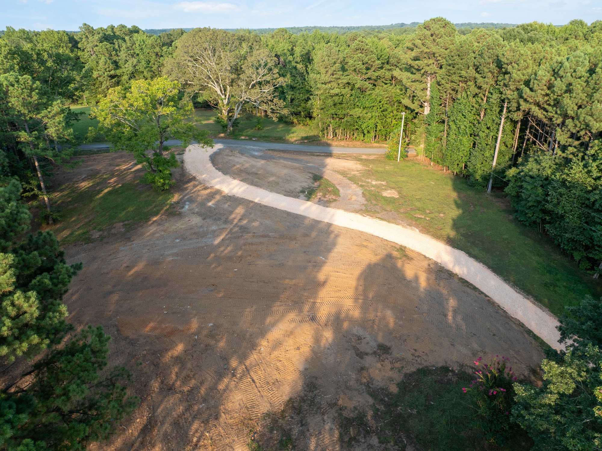 890 Kyle Road Huntingdon, TN 38344 - Photo 16 of 29 a view of a yard with an trees
