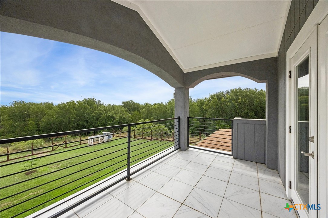 730 Spoke Hollow Road Lockhart, TX 78644 - Photo 21 of 41 UPSTAIRS BALCONY