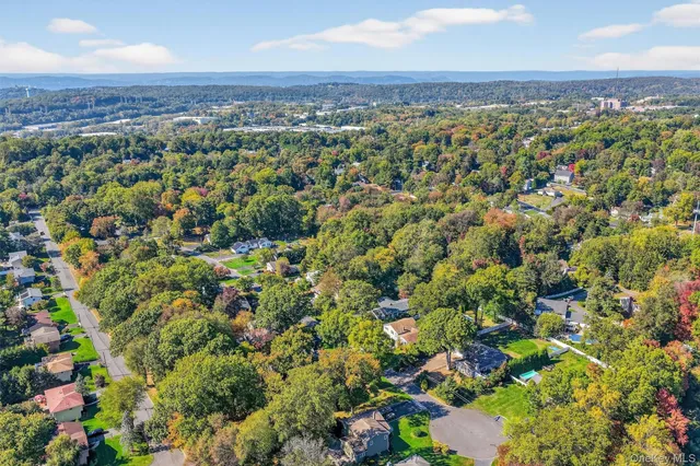 a view of a city with mountain