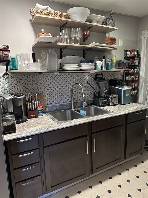 52 Warner Street Springfield, MA 01108 - Photo 3 of 8 a kitchen with a cabinets and wooden floor