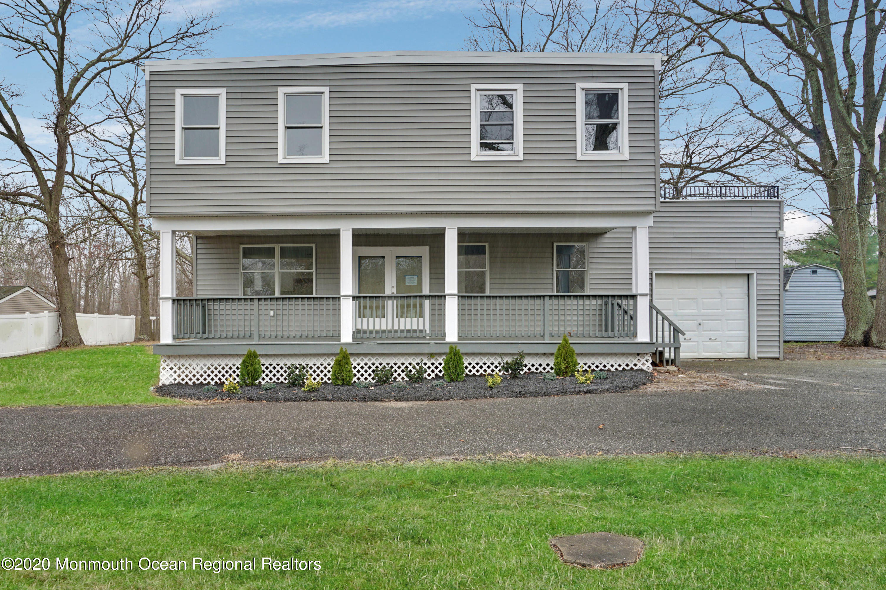 17 Helen Avenue Howell, NJ 07731 - Photo 2 of 67 a front view of a house with a garden and plants