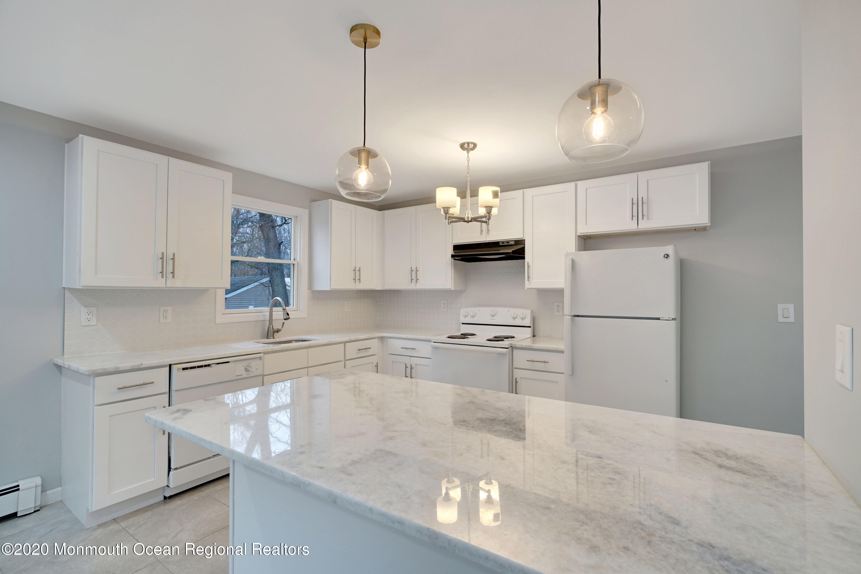 17 Helen Avenue Howell, NJ 07731 - Photo 16 of 67 a kitchen with stainless steel appliances granite countertop a sink a stove and a refrigerator