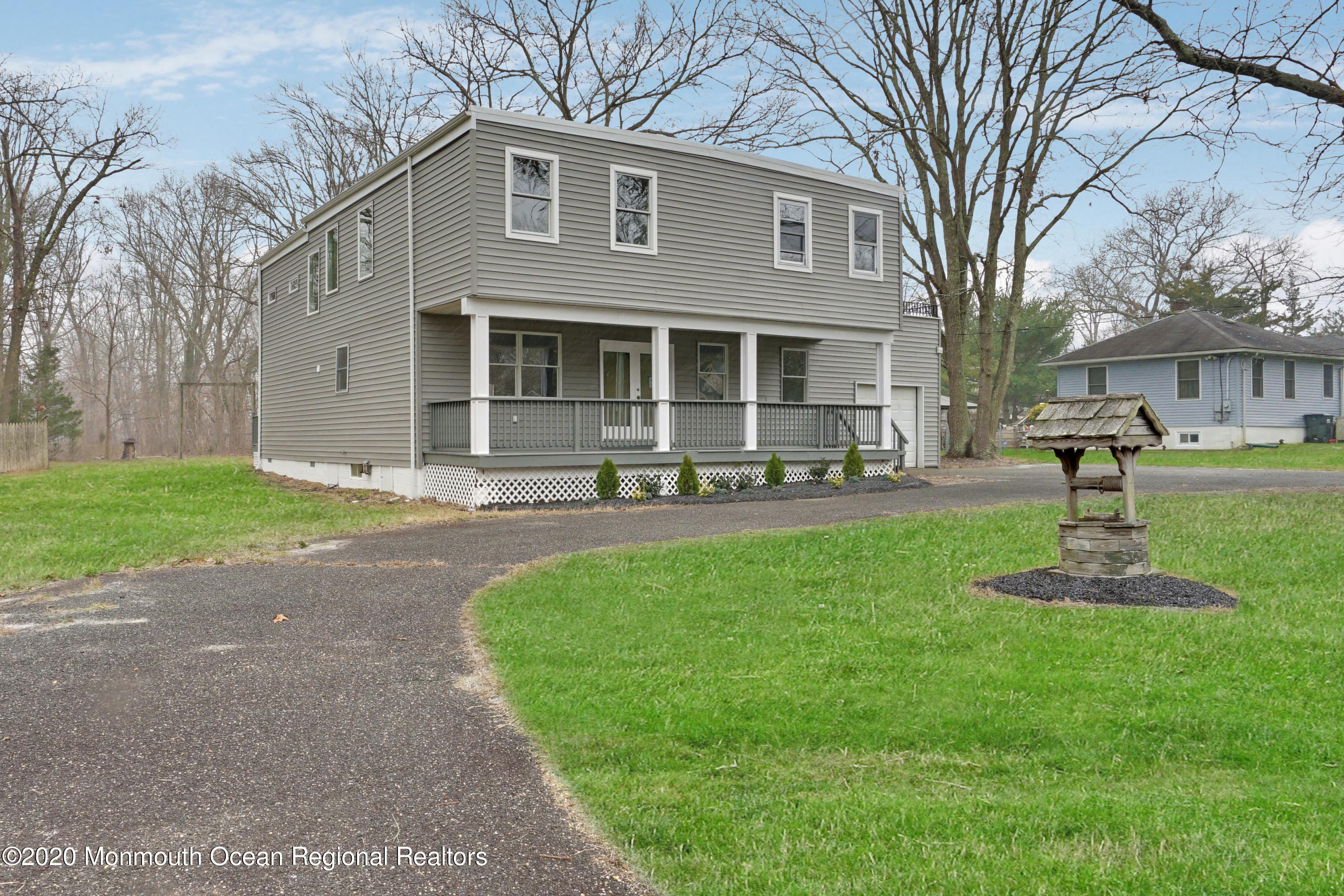 17 Helen Avenue Howell, NJ 07731 - Photo 3 of 67 a front view of a house with garden and a tree