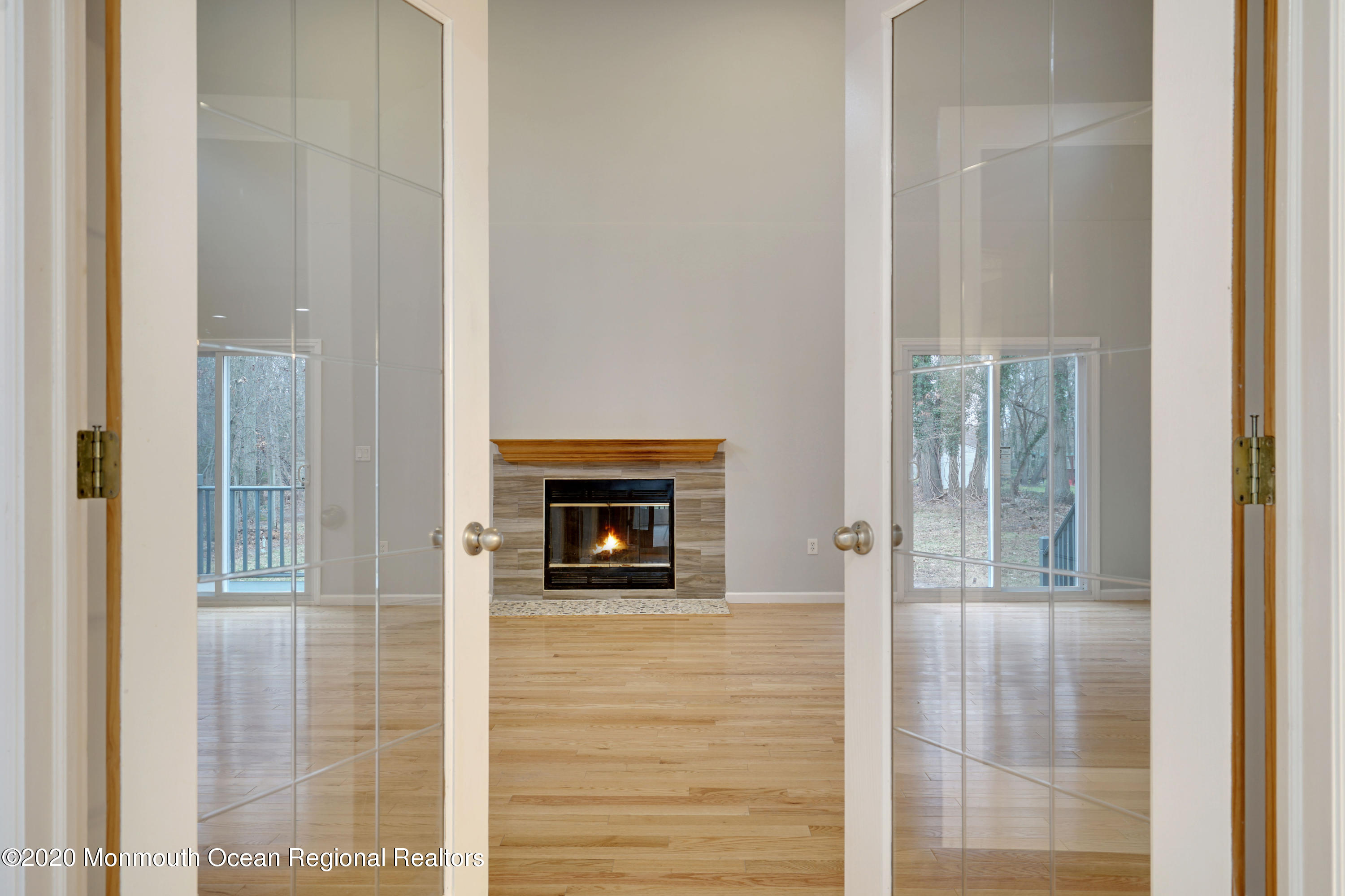 17 Helen Avenue Howell, NJ 07731 - Photo 22 of 67 a view of an empty room with glass door