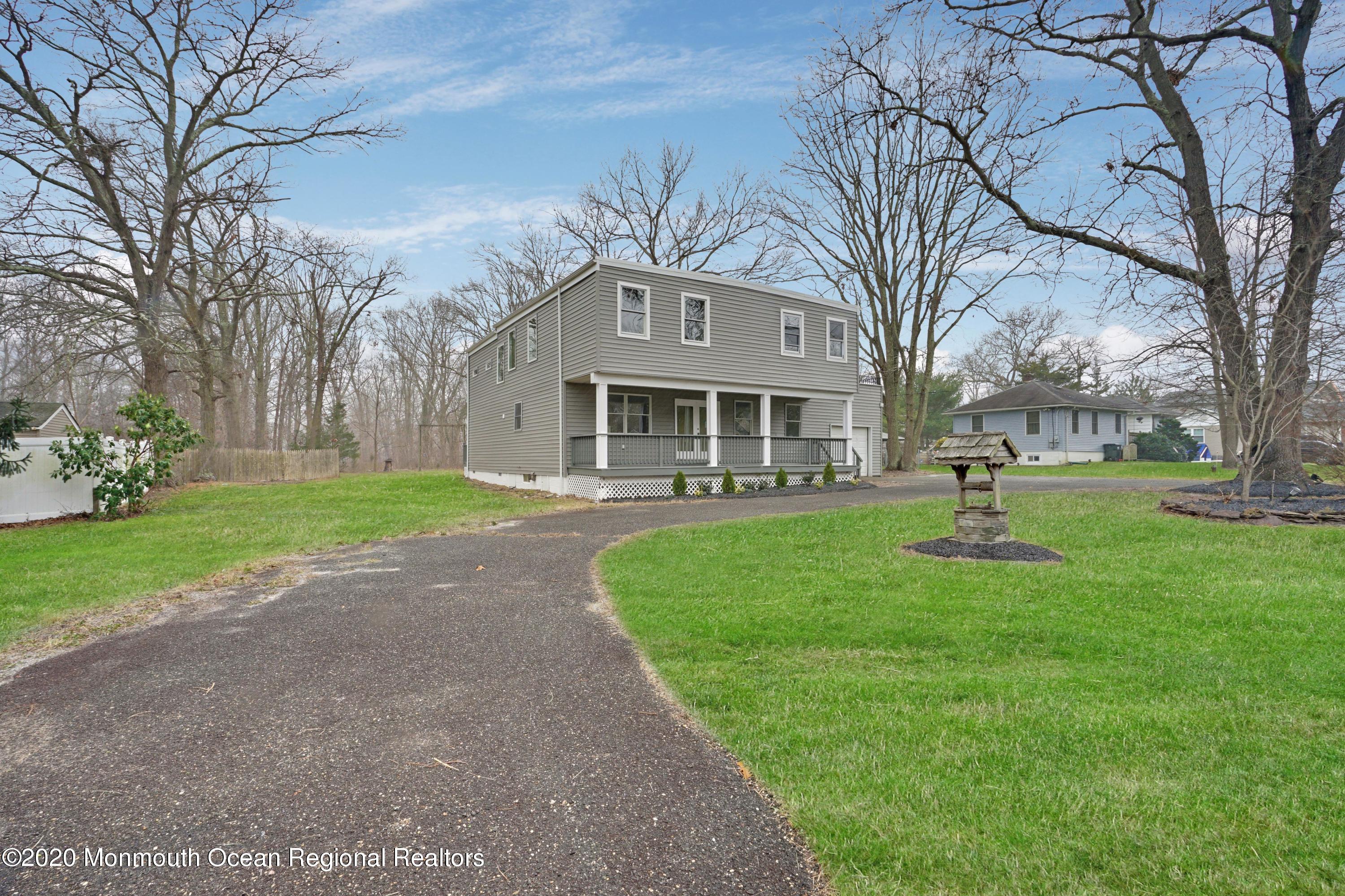 17 Helen Avenue Howell, NJ 07731 - Photo 4 of 67 a front view of a house with a yard