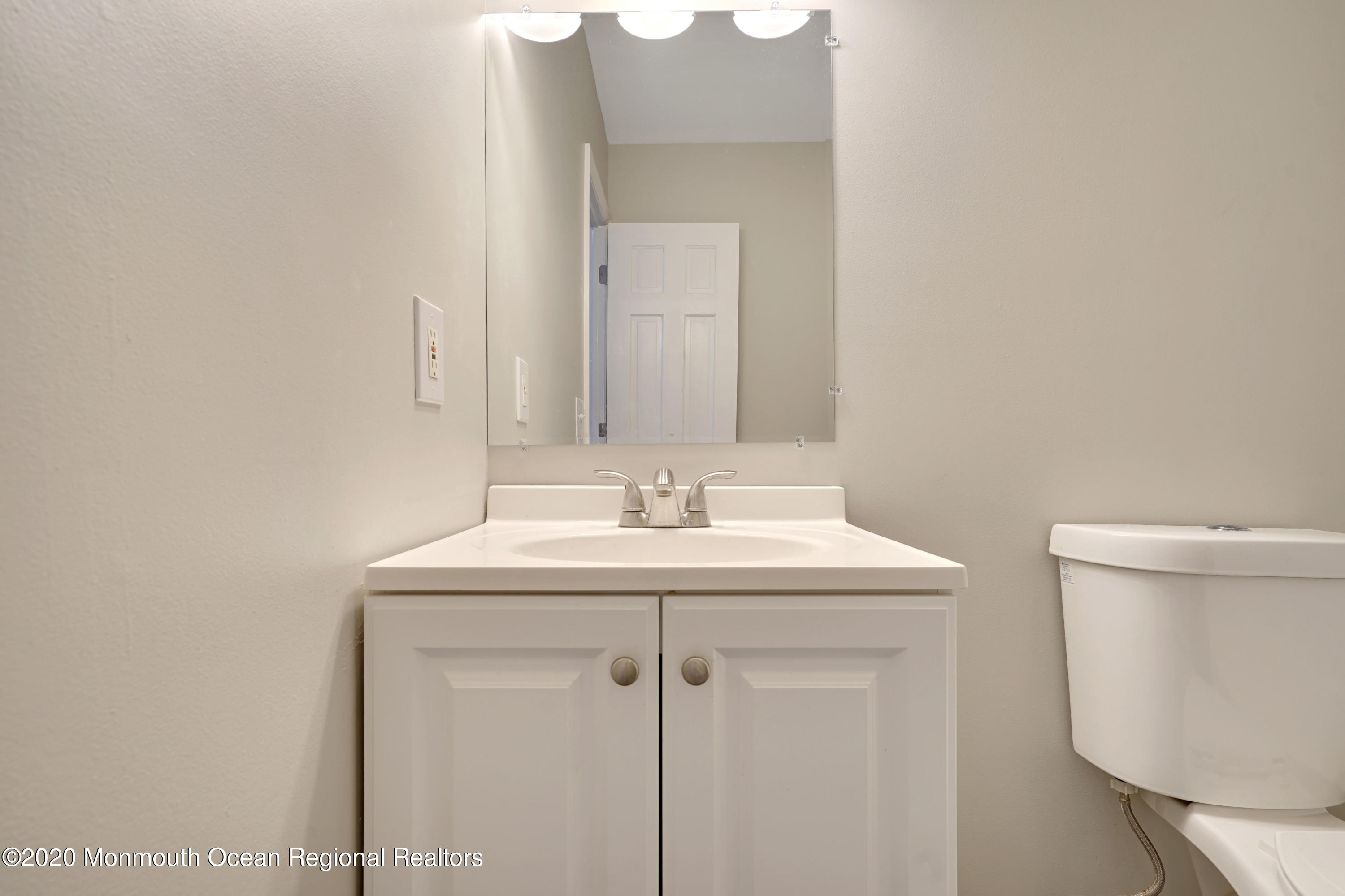 17 Helen Avenue Howell, NJ 07731 - Photo 34 of 67 a bathroom with a sink a toilet and a mirror