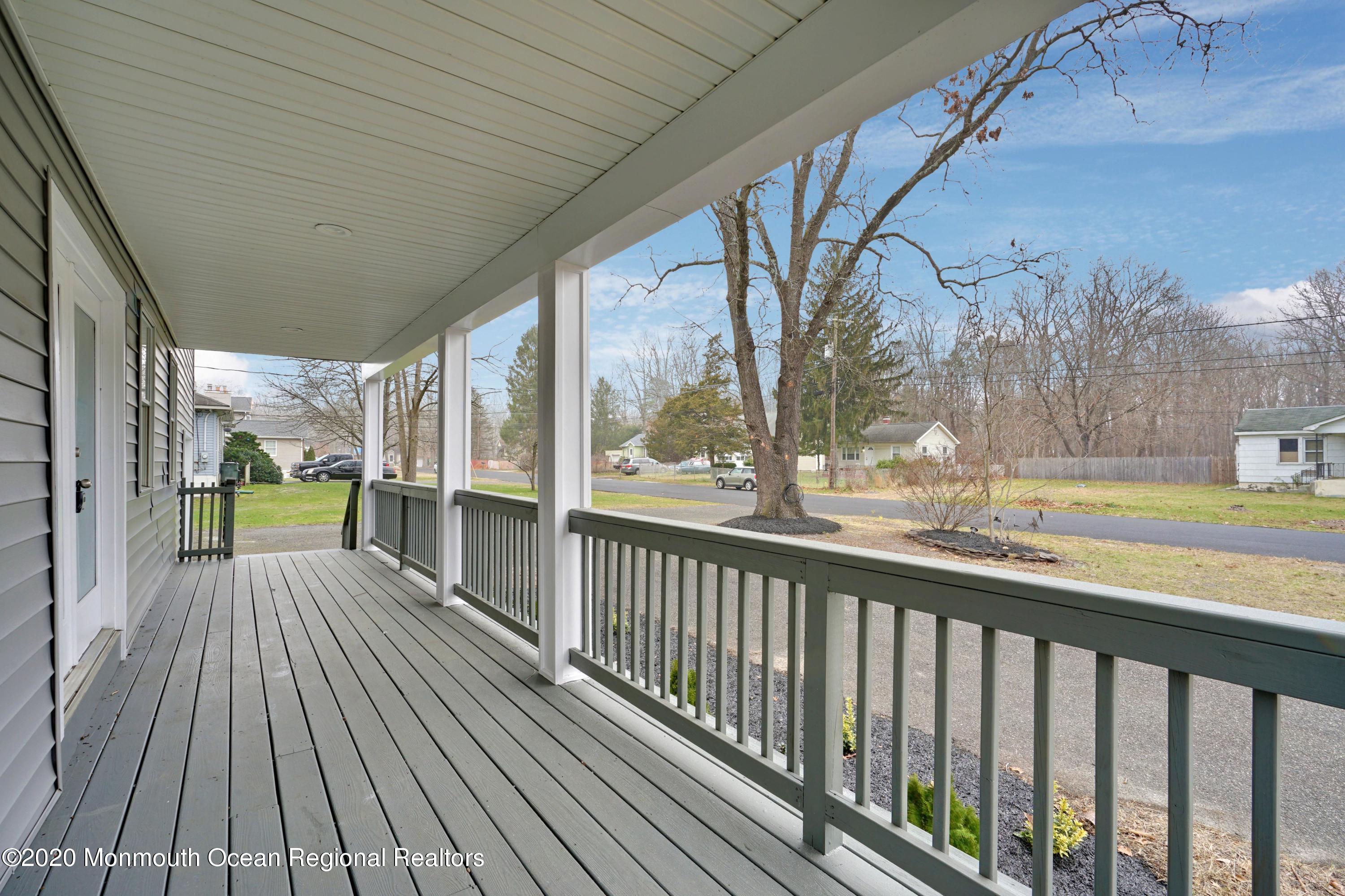 17 Helen Avenue Howell, NJ 07731 - Photo 6 of 67 a view of a balcony with wooden floor