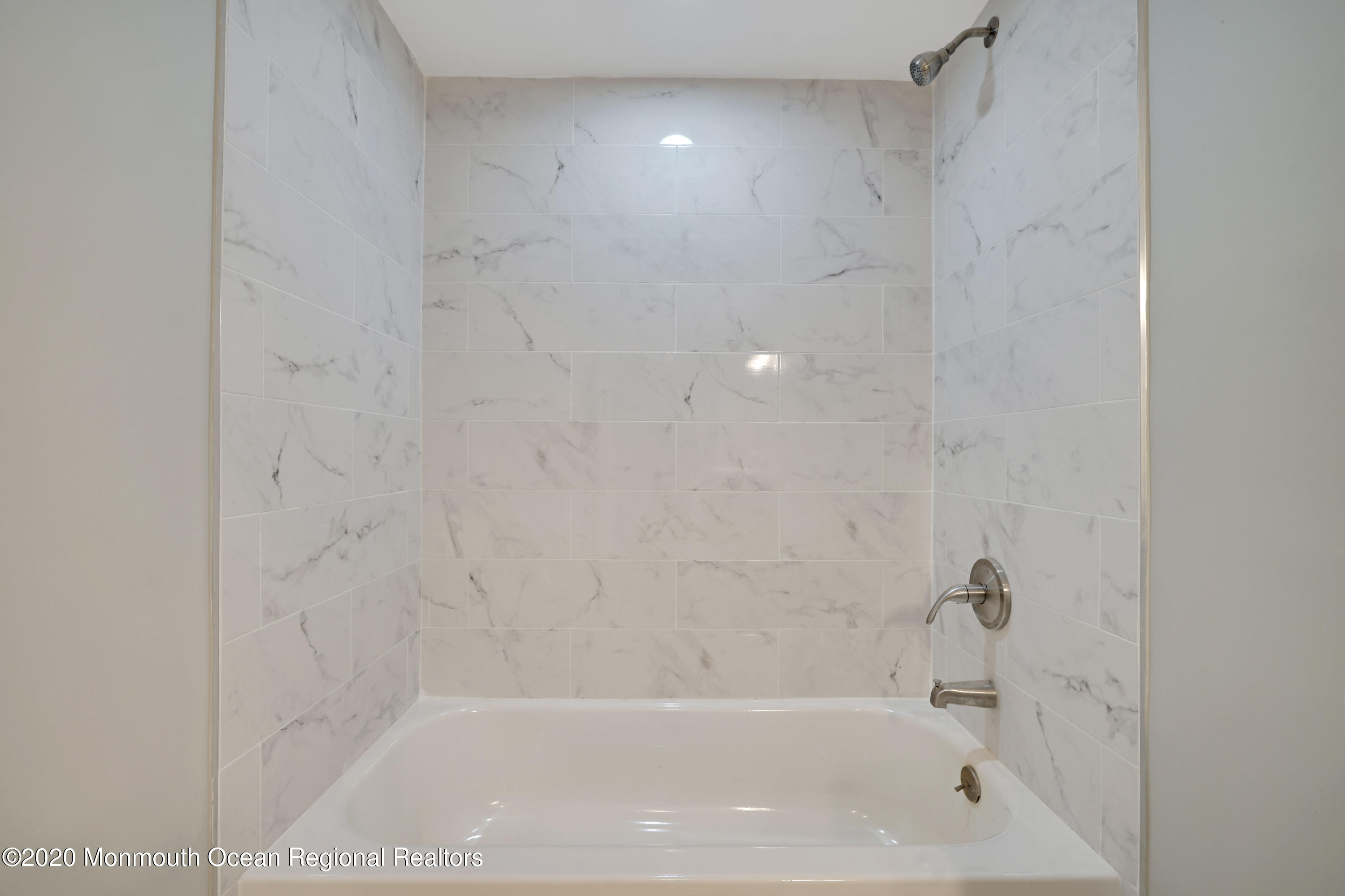 17 Helen Avenue Howell, NJ 07731 - Photo 65 of 67 a close view of a bathtub in bathroom