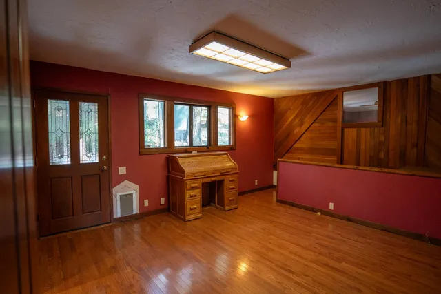 a bath room with a sink and a window