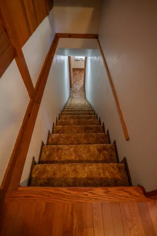 a view of entryway with wooden floor