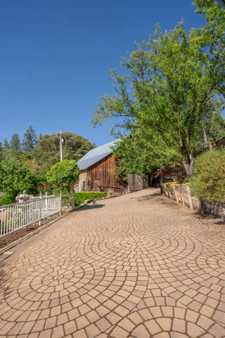a bed room with a bed and a book shelf