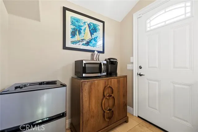 a view of front door with wooden floor