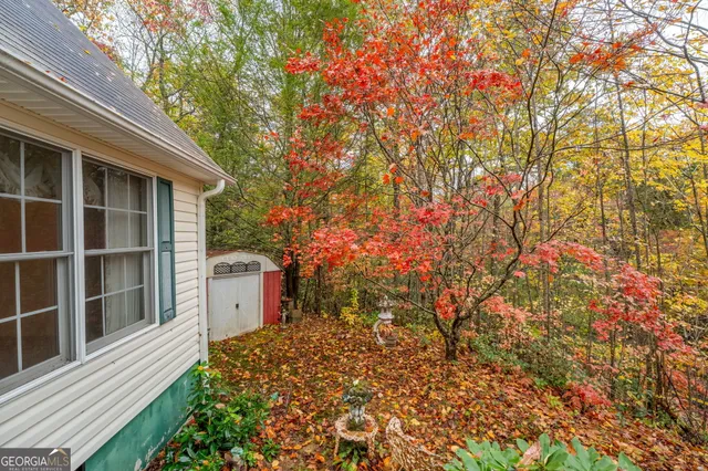 a view of a city with lush green forest