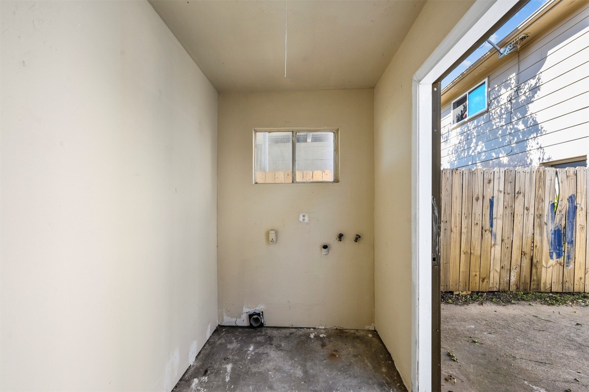 7236 Crownwest Street, Unit 7236 Houston, TX 77072 - Photo 19 of 21 a view of small space with sliding door and wooden floor