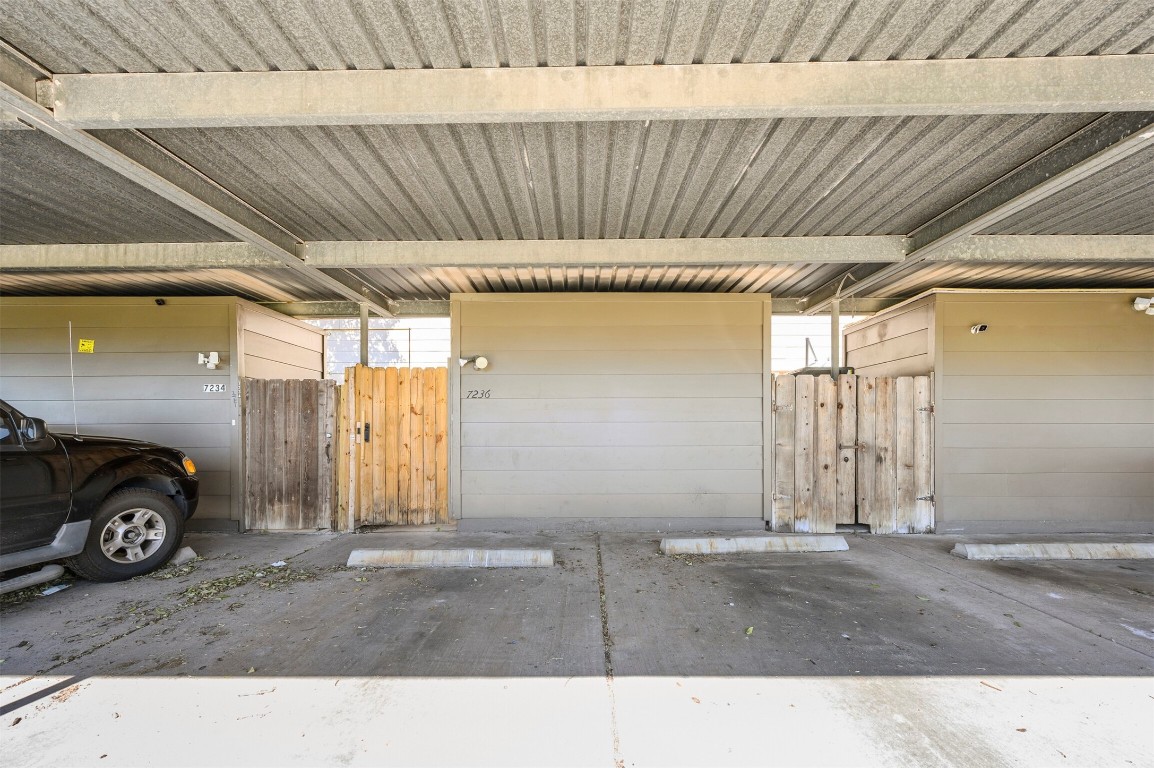 7236 Crownwest Street, Unit 7236 Houston, TX 77072 - Photo 21 of 21 a black car parked in garage