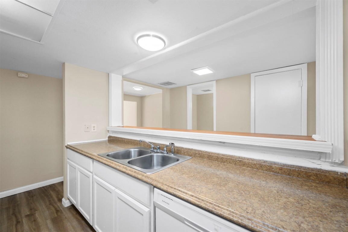 7236 Crownwest Street, Unit 7236 Houston, TX 77072 - Photo 5 of 21 a kitchen with a sink and cabinets