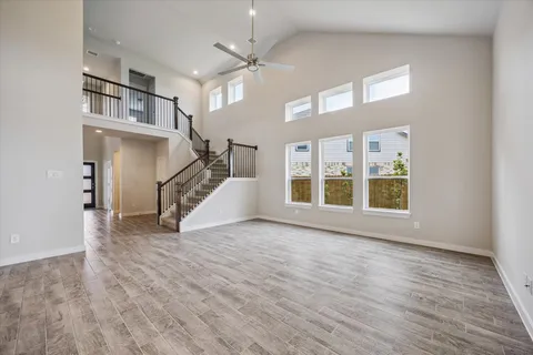 a view of an entryway with wooden floor