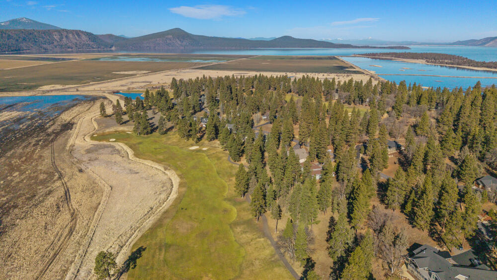 11750 Merganser Road Klamath Falls, OR 97601 - Photo 63 of 66 a view of a lake with a mountain in the background