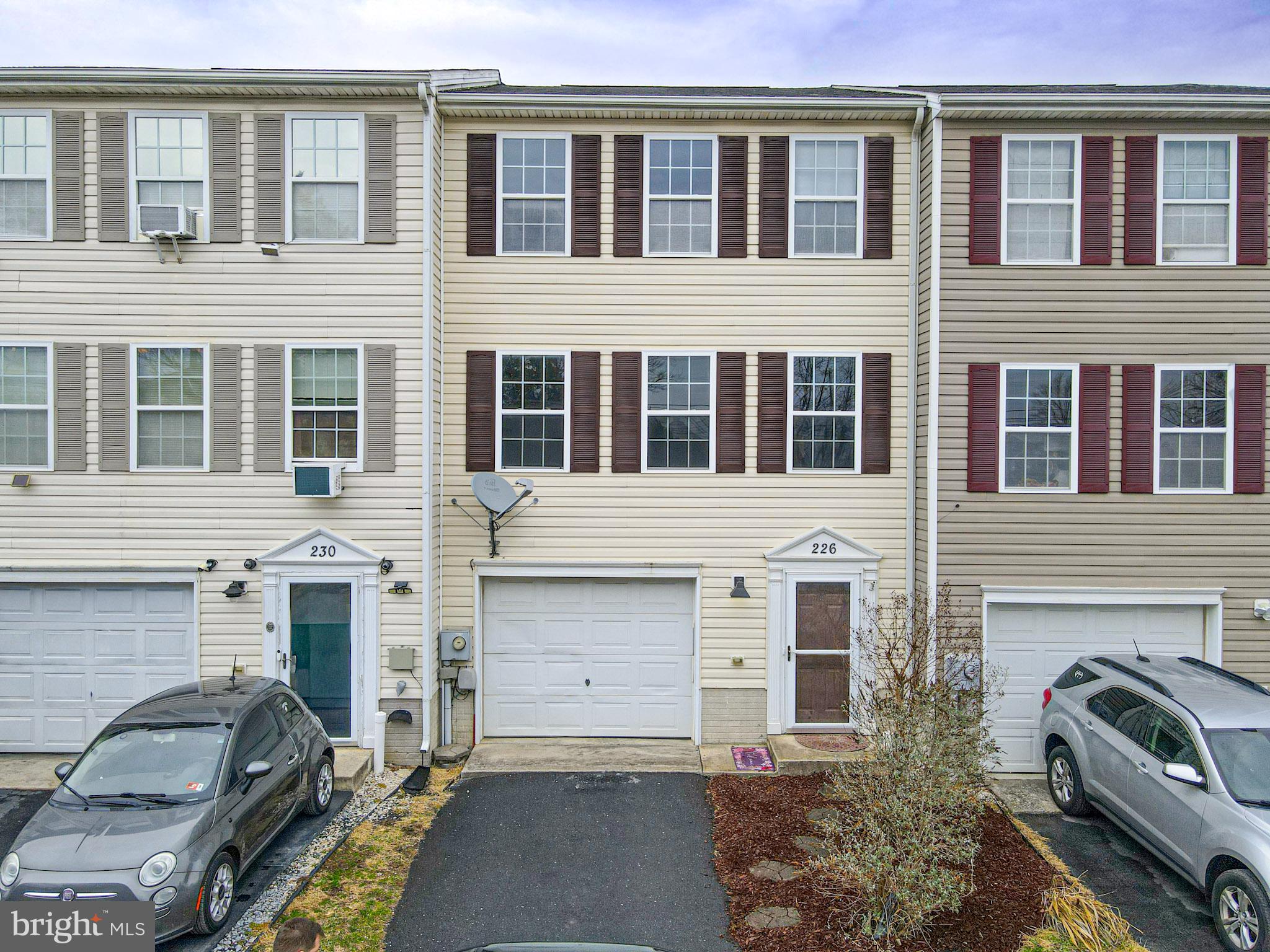 a view of a balcony with furniture and a window