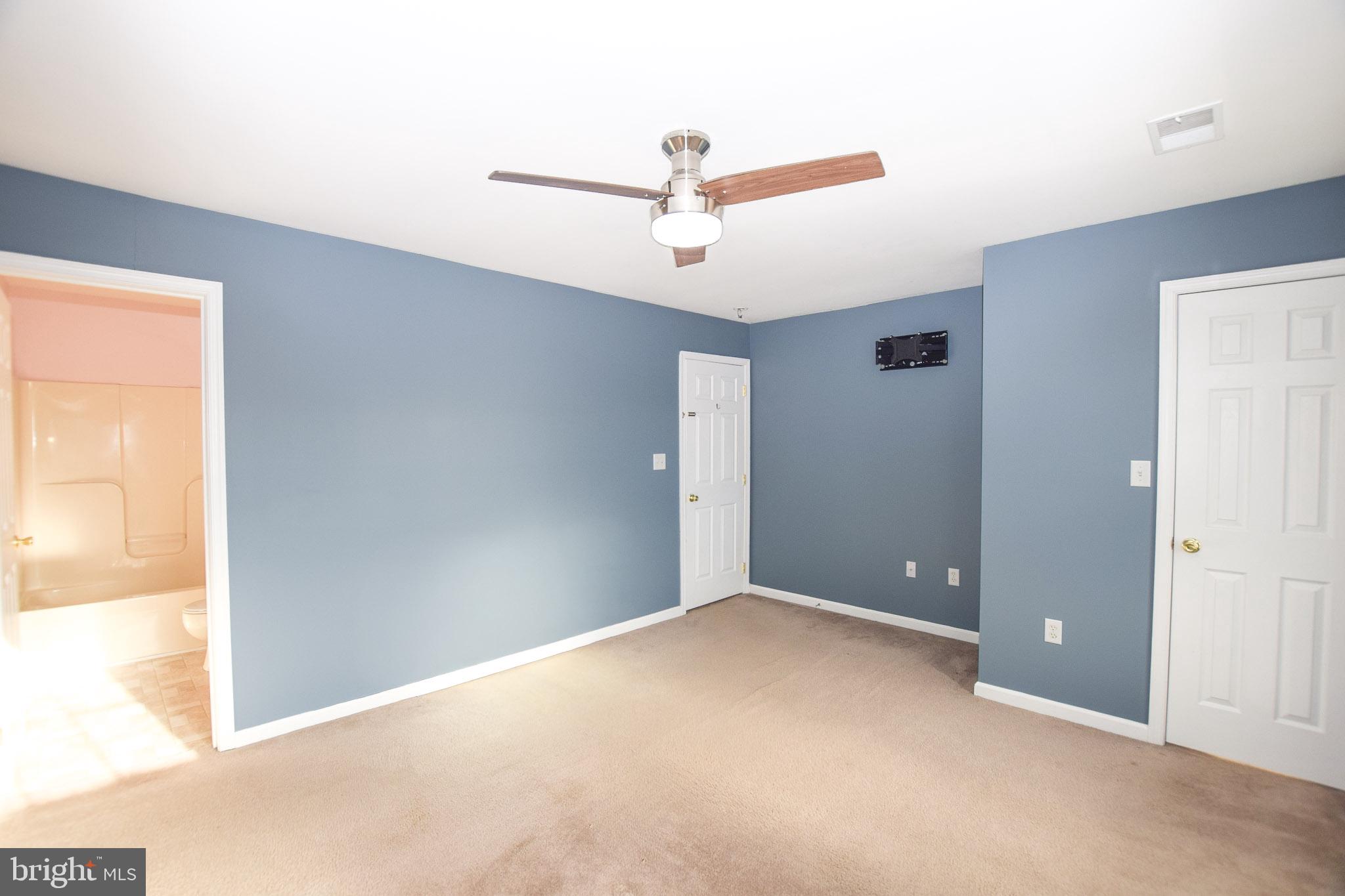 226 Topaz Lane Inwood, WV 25428 - Photo 24 of 32 an empty room with closet and windows
