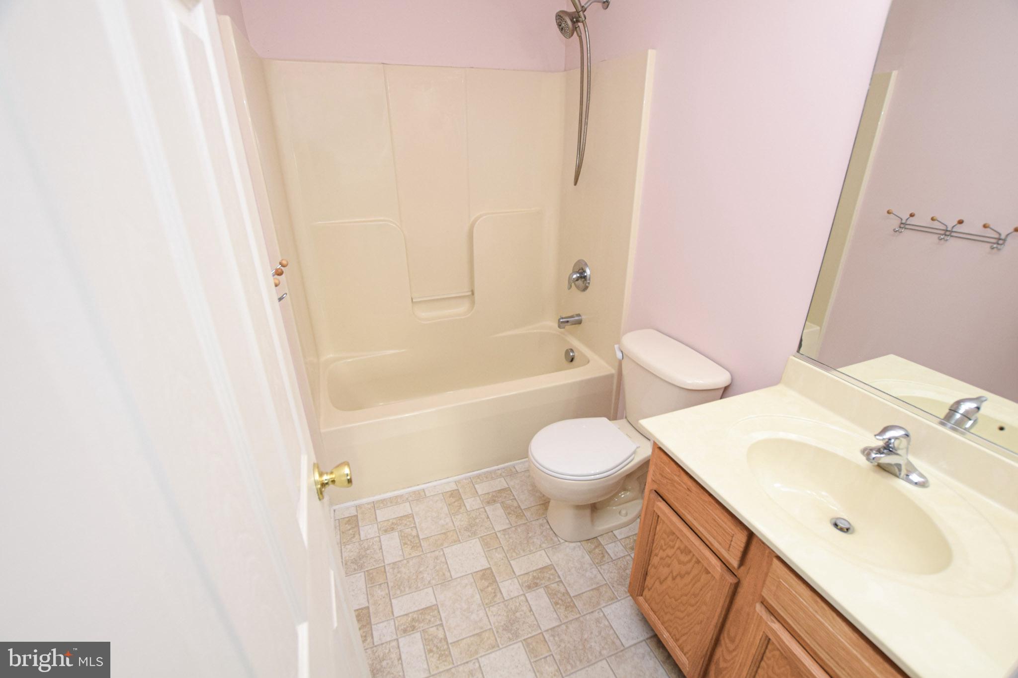 226 Topaz Lane Inwood, WV 25428 - Photo 26 of 32 a bathroom with a sink toilet and shower