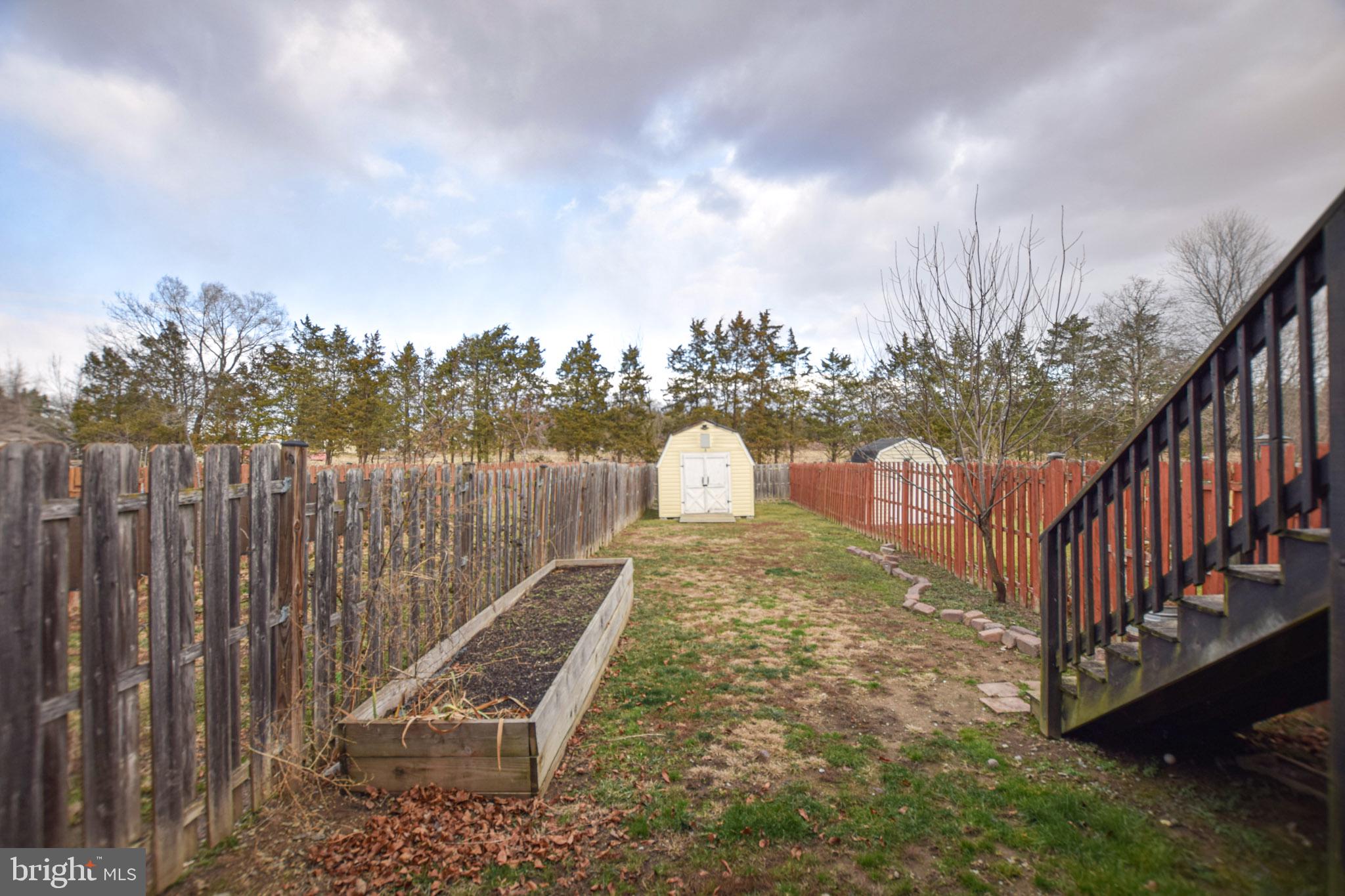 226 Topaz Lane Inwood, WV 25428 - Photo 28 of 32 a view of a yard with staircase