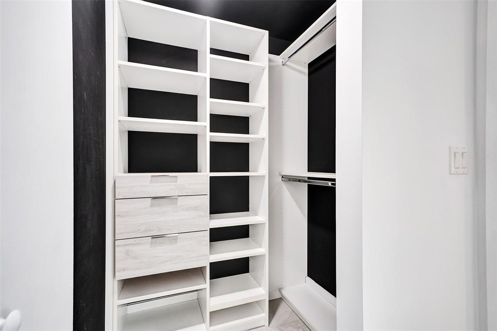 488 Northeast 18th Street, Unit 801 Miami, FL 33132 - Photo 12 of 46 a view of walk in closet with empty racks