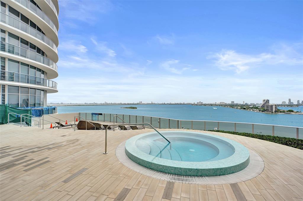 488 Northeast 18th Street, Unit 801 Miami, FL 33132 - Photo 21 of 46 a terrace with outdoor seating and city view