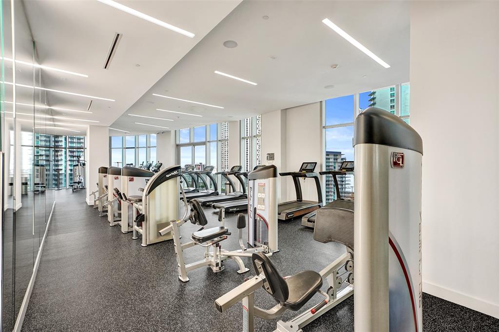 488 Northeast 18th Street, Unit 801 Miami, FL 33132 - Photo 29 of 46 a view of a room with gym equipment