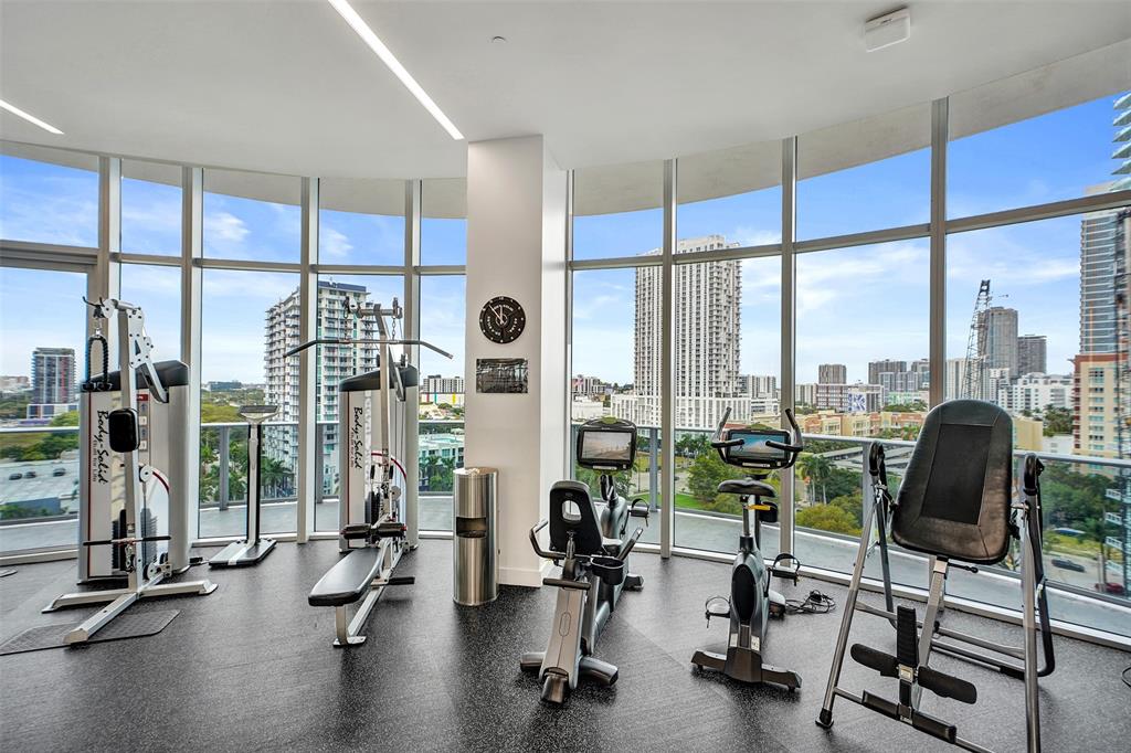 488 Northeast 18th Street, Unit 801 Miami, FL 33132 - Photo 30 of 46 a view of a room with gym equipment