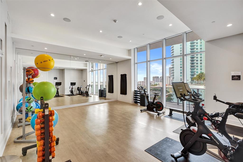 488 Northeast 18th Street, Unit 801 Miami, FL 33132 - Photo 33 of 46 a view of a room with gym equipment