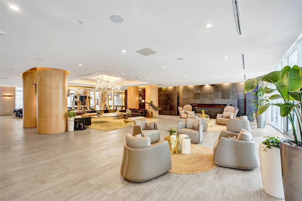 488 Northeast 18th Street, Unit 801 Miami, FL 33132 - Photo 35 of 46 a living room with furniture and a large window