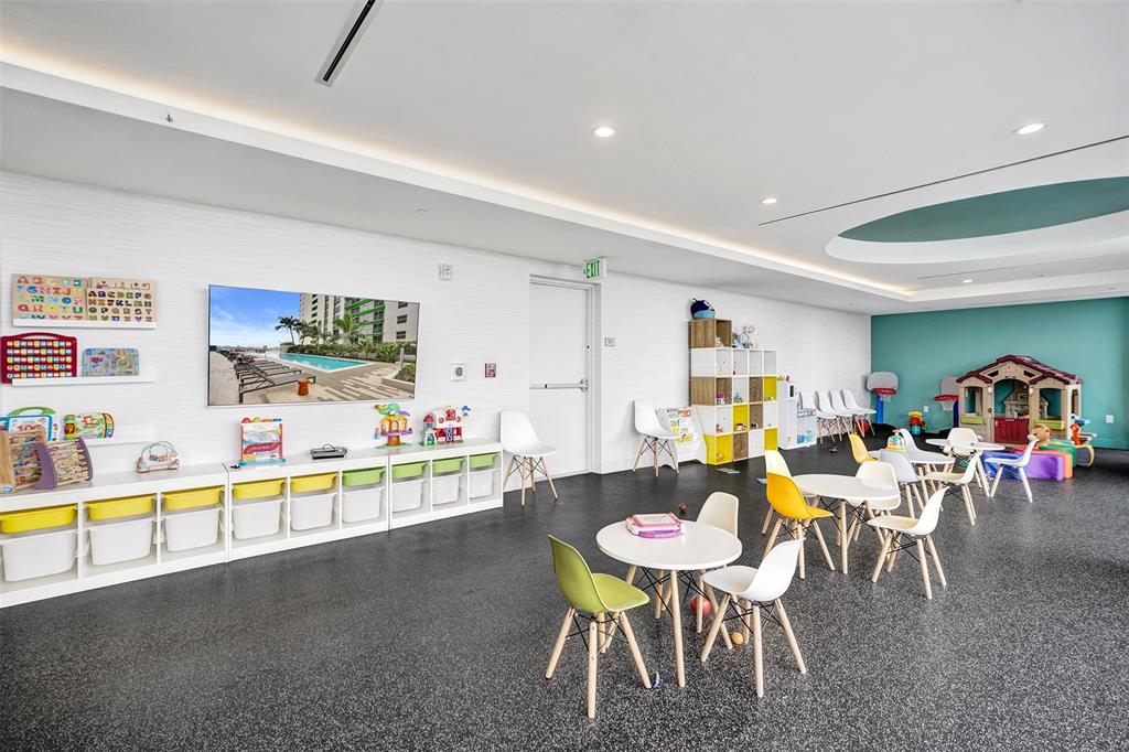 488 Northeast 18th Street, Unit 801 Miami, FL 33132 - Photo 40 of 46 a dining room with furniture and a wooden floor