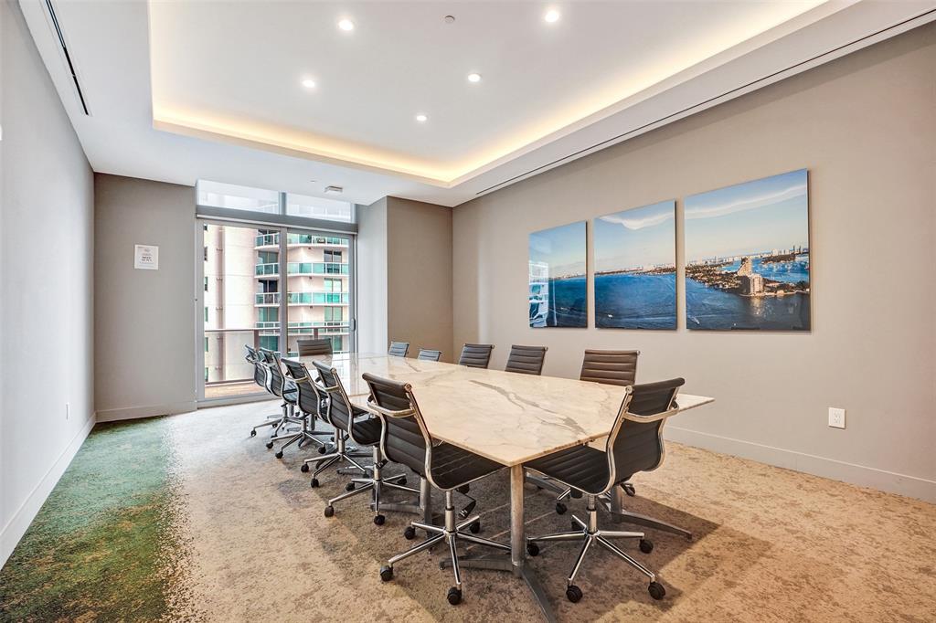 488 Northeast 18th Street, Unit 801 Miami, FL 33132 - Photo 42 of 46 a view of a dining room with furniture