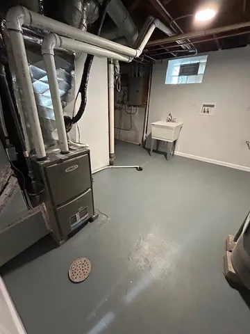 a view of storage and utility room with racks on the wall