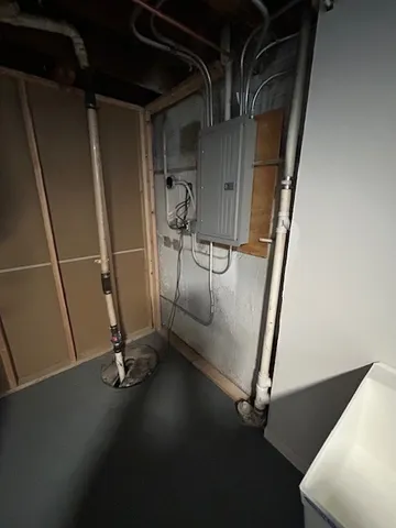 a pathway of a house with a yard