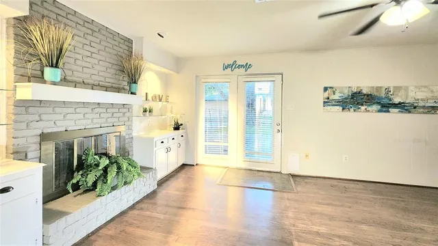 a view of livingroom with furniture wooden floor and window