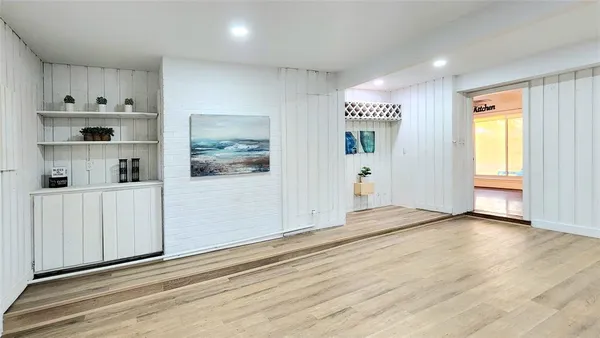 a view of livingroom with furniture and wooden floor
