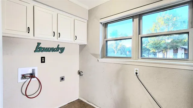 a white bath tub sitting next to a window