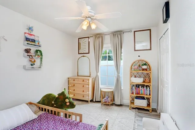 a living room with baby toys