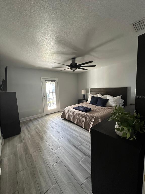 3122 West Grace Street Tampa, FL 33607 - Photo 22 of 46 a bedroom with a bed and a window