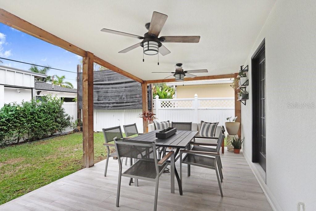 3122 West Grace Street Tampa, FL 33607 - Photo 25 of 31 a view of an outside dining space with furniture