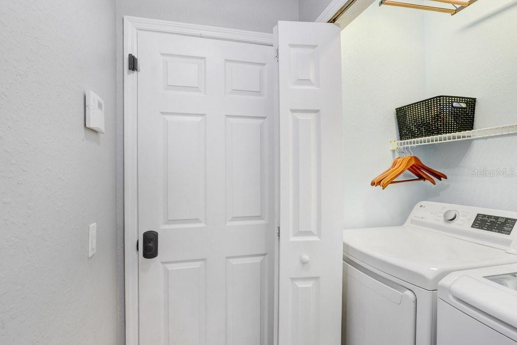 3122 West Grace Street Tampa, FL 33607 - Photo 37 of 46 a utility room with dryer and washer