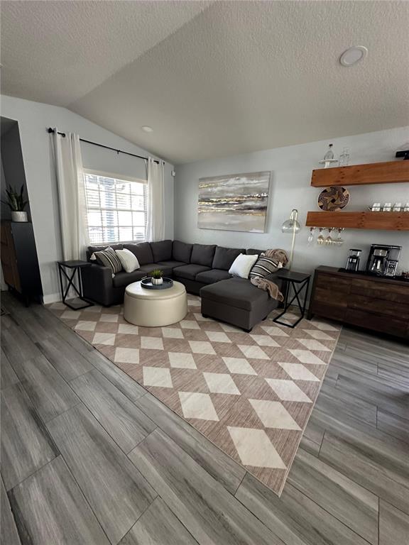 3122 West Grace Street Tampa, FL 33607 - Photo 9 of 46 a living room with furniture and a large window