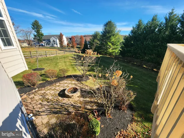 a view of swimming pool from a lake view