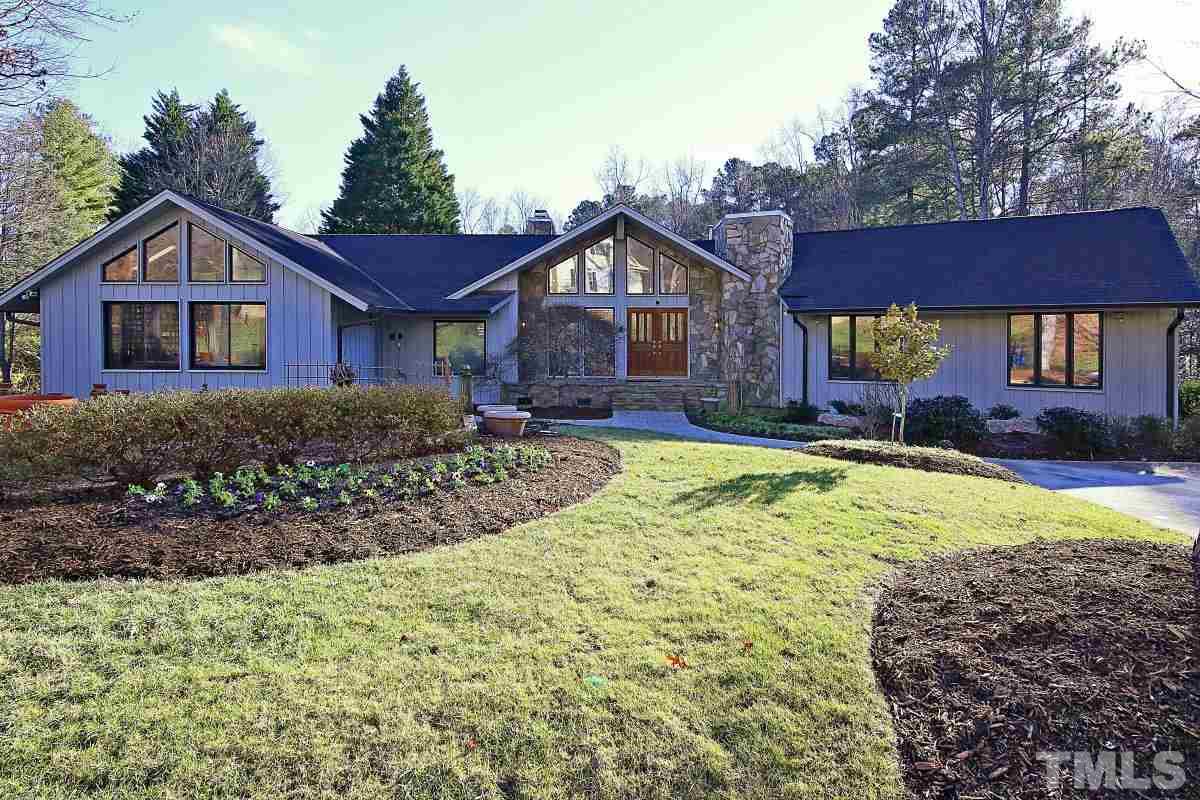 7209 Rainwater Road Raleigh, NC 27615 - Photo 2 of 25 a view of a house with a yard and plants