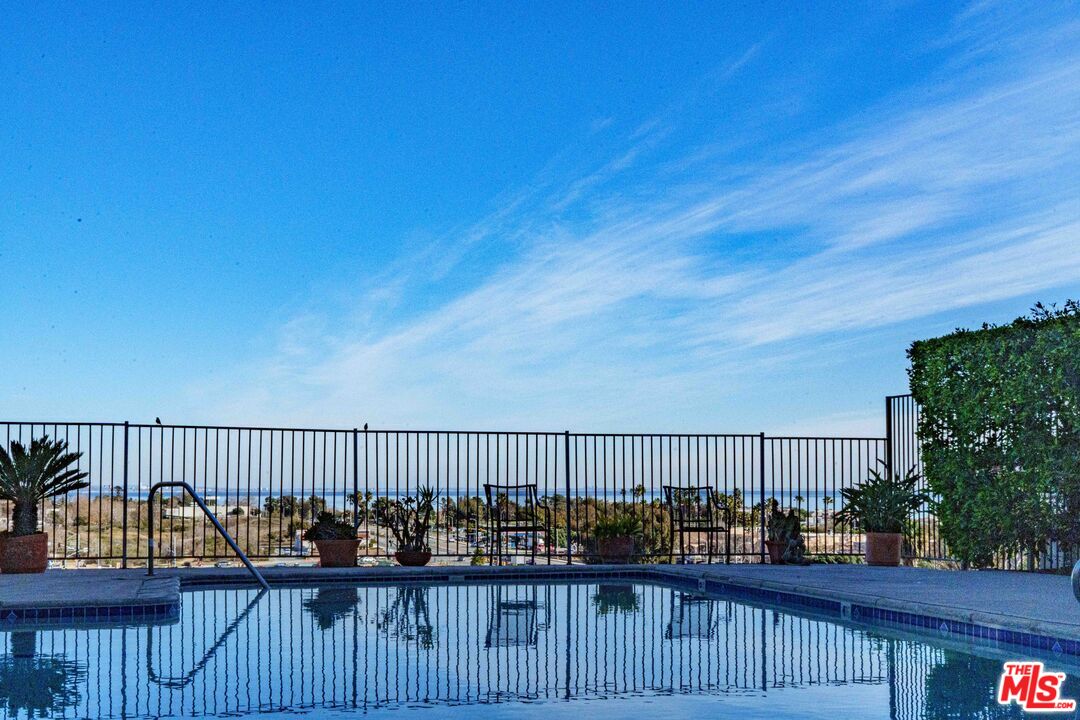 23901 Civic Center Way, Unit B137 Malibu, CA 90265 - Photo 3 of 27 a view of deck with wooden fence