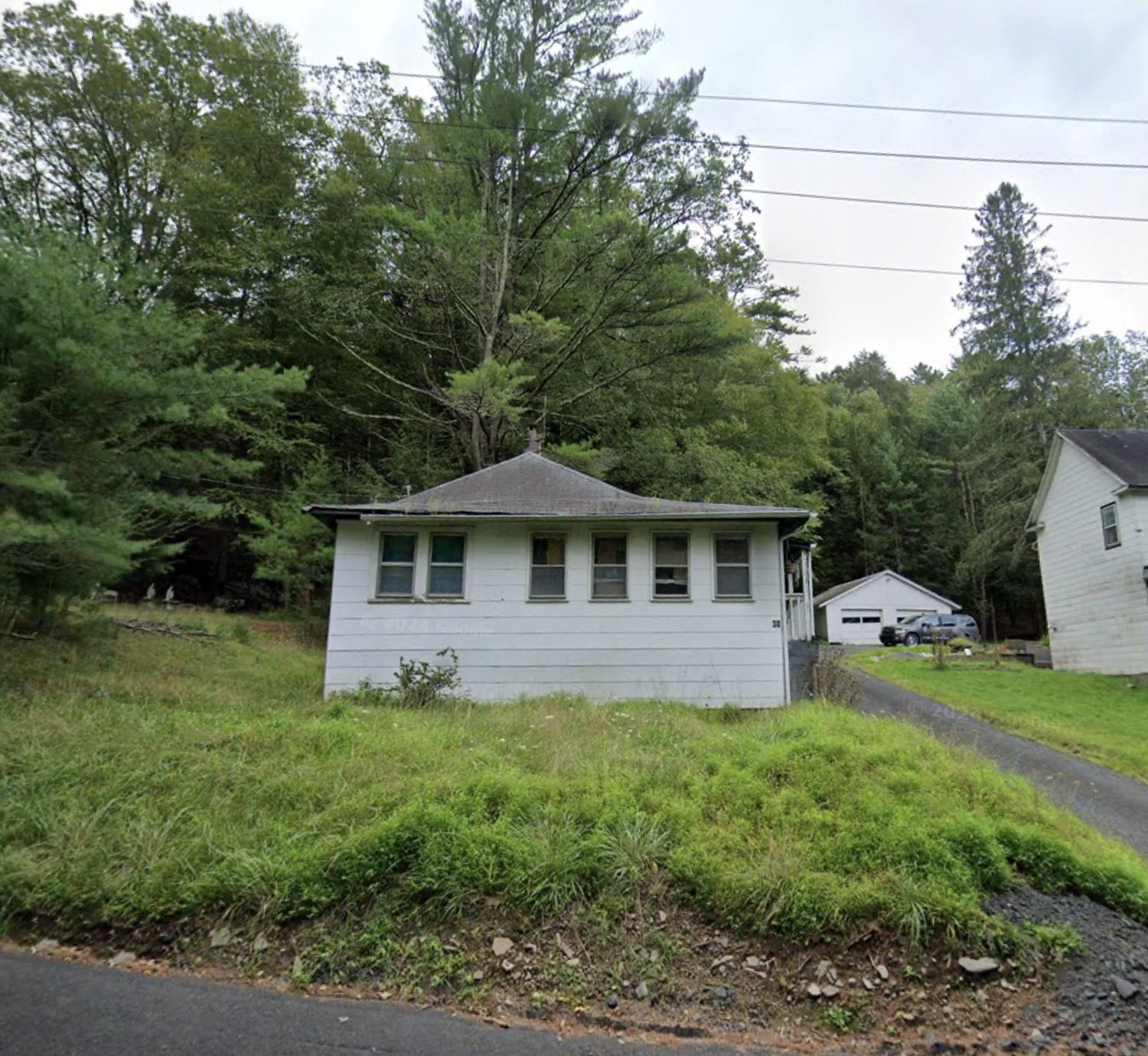 30 Highland Lake Road Eldred, NY 12732 - Photo 2 of 2 View of front facade with a detached garage
